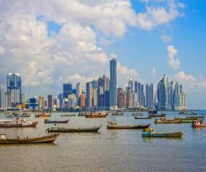 Photo of the skyline of Panama City and harbor with many fishing boats in the Republic of Panama.