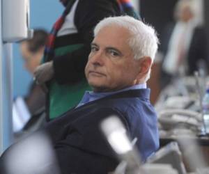 Panamanian former president and deputy of the Central American Parliament (Parlacen) Ricardo Martinelli is seen during a parliament's plenary session in Guatemala city on January 29, 2015. Panama's Supreme Court has decided to open a corruption probe against Martinelli, a supermarket magnate, over allegations he inflated contracts worth $45 million to purchase dehydrated food for a government social program. Martinelli has denied the charges and says he is the target of political persecution by his successor, Juan Carlos Varela. AFP PHOTO/Johan Ordonez / AFP PHOTO / JOHAN ORDONEZ