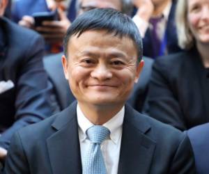 (FILES) This file photo taken on January 9, 2018 shows Alibaba's chairman Jack Ma attending the first meeting of the French-Chinese business council in Beijing. - China's wealthiest people became a record 1.5 trillion USD richer in 2020 despite the economic blow dealt by COVID-19 coronavirus pandemic, riding on a booming digital economy and exceeding the past five years combined, a report said on October 20, 2020. (Photo by Ludovic MARIN / AFP)