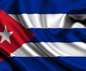 A Cuban national flag flies at half-mast in tribute to the victims of a plane that crashed shortly after taking off from Jose Marti airport kiling 107 people, in Havana, on May 19, 2018. - Cuba begins two days of national mourning Saturday for victims of the crash of a state airways plane that killed all but three of its 110 passengers and crew. President Miguel Diaz-Canel said an investigation was under way into Friday's crash of the nearly 40-year-old Boeing 737, leased to the national carrier Cubana de Aviacion by a Mexican company. (Photo by Yamil LAGE / AFP)