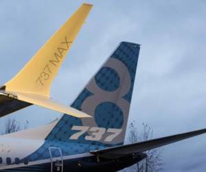 Boeings first 737 MAX named the 'Spirit of Renton' is parked on the tarmac at the Boeing factory in Renton, Washington on December 8, 2015. The latest version of Boeing's best-selling 737, introduced in the mid-1960s, is due to make its first flight early next year and reach customers in 2017. It will burn an estimated 14 percent less fuel per seat than current 737s and fly farther, allowing airlines to open new routes. AFP PHOTO/JASON REDMOND (Photo by JASON REDMOND / AFP)