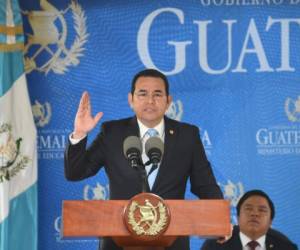 Guatemalan President Jimmy Morales delivers a speech at the Ministry of Education building in Guatemala City, on September 3, 2018.Guatemalan President Jimmy Morales announced Friday Guatemala will not renew the mandate of a UN anti-corruption mission, which he accused of improper interference on internal matters of the country. The Commission presented evidence that Morales' FCN-Nacion party failed to report nearly one million dollars in financing to electoral authorities during his successful 2015 presidential campaign. / AFP PHOTO / Johan ORDONEZ