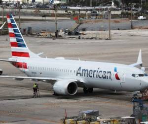 MIAMI, FL - MARCH 14: A grounded American Airlines Boeing 737 Max 8 is seen parked at Miami International Airport on March 14, 2019 in Miami, Florida. The Federal Aviation Administration grounded the entire United States Boeing 737 Max fleet. Joe Raedle/Getty Images/AFP