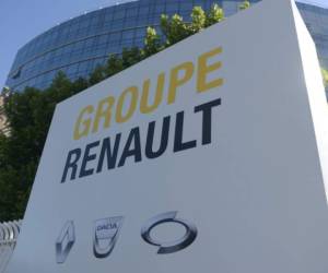 The French multinational automobile manufacturer Groupe Renault sign, RenaultNissanMitsubishi Alliance, in Boulogne Billancourt on May 29, 2020. - Renault said on May 29, 2020, it will cut nearly 15,000 jobs, including 4,600 at its core French operations, as it tries to regain its footing in the wake of plummeting car sales and the shift to electric vehicles. (Photo by Eric PIERMONT / AFP)