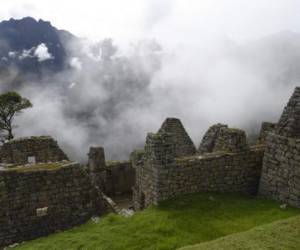 View of the Machu Picchu complex, the Inca fortress enclaved in the south eastern Andes of Peru on April 24, 2019. (Photo by Pablo PORCIUNCULA BRUNE / AFP)