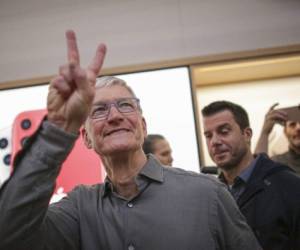 Apple CEO Tim Cook gestures after opening the newly renovated Apple Store at Fifth Avenue on September 20, 2019 in New York City. (Photo by Kena Betancur / AFP)