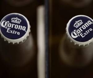 SAN RAFAEL, CA - JUNE 29: Bottles of Corona are displayed in a cooler at Marin Beverage Outlet on June 29, 2018 in San Rafael, California. Shares of Constellation Brands fell 5 percent in Friday trading after reporting lower than expected first-quarter earnings. Justin Sullivan/Getty Images/AFP