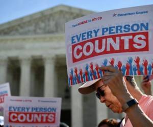 (FILES) In this file photo demonstrators rally at the US Supreme Court in Washington, DC, on April 23, 2019, to protest a proposal to add a citizenship question in the 2020 Census. - US President Donald Trump's administration wages its last major policy fight before the Supreme Court on November 30, 2020 as it seeks to exclude undocumented immigrants from the population count used to determine states' representation in Congress. If the outgoing president's plan goes forward, states with large numbers of undocumented immigrants could see their influence reduced in the US House of Representatives. (Photo by MANDEL NGAN / AFP)