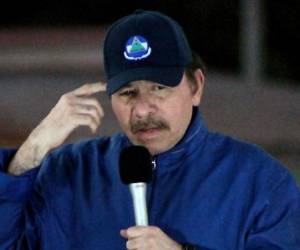 Nicaragua's President Daniel Ortega delivers a speech during the inauguration of the Nejapa flyover in Managua on March 21, 2019. - Nicaragua's government and opposition delegations resumed stalled peace talks Thursday aimed at ending a deadly 11-month political crisis. The resumption follows an agreement on Wednesday by the government of President Daniel Ortega to release all opposition prisoners within 90 days. (Photo by Maynor Valenzuela / AFP)