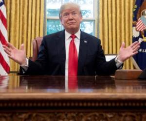 (FILES) In this file photo taken on October 10, 2018 US President Donald Trump speaks during a briefing on Hurricane Michael in the Oval Office of the White House in Washington, DC. - President Donald Trump kept up the pressure on Mexico October 31, 2018 to halt groups of migrants heading to the American border, as the US enters the final stretch of campaigning before key midterm elections. Trump has sought to put immigration front and center ahead of next week's hotly-contested vote, ordering thousands of troops to the southern border and threatening to end automatic citizenship for US-born children of immigrants. (Photo by SAUL LOEB / AFP)
