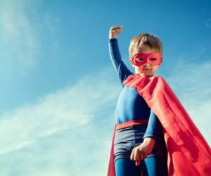 Superhero child concept for childhood, imagination and aspirations
