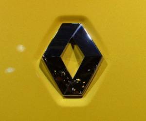 The Renault Megane sports car logo is pictured at the Auto Expo 2014 in Greater Noida on the outskirts of New Delhi on February 5, 2014. The 12th edition of the Auto Expo takes place from February 5-11. AFP PHOTO/ SAJJAD HUSSAIN (Photo by SAJJAD HUSSAIN / AFP)