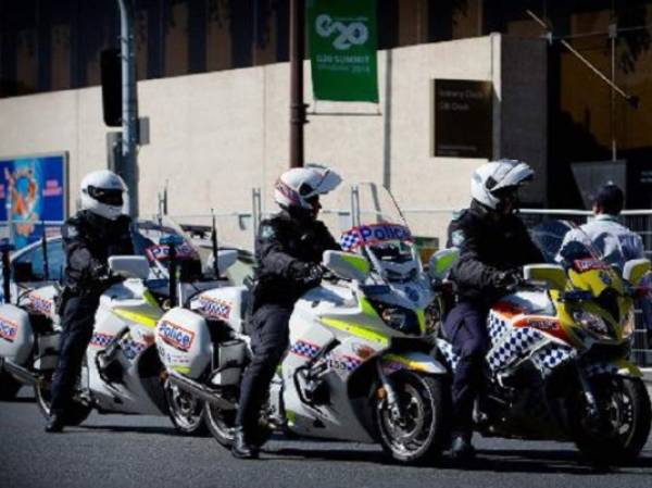 La policía de Queensland patrulla cerca del Centro de Exposiciones y Convenciones de Brisbane (Australia) el 12 de noviembre de 2014, días antes del comienzo de la reunión del G20. (Foto: AFP)