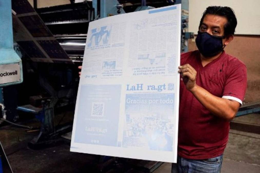 The head of production of Guatemala's newspaper La Hora, Byron Cruz, poses for a picture after an interview with AFP in Guatemala City on November 12, 2021. - After 101 years, the evening newspaper La Hora de Guatemala printed its last paper edition on Friday, amid the nostalgia of workers and readers. As of Saturday, only an online edition will be avilable. (Photo by Johan ORDONEZ / AFP)