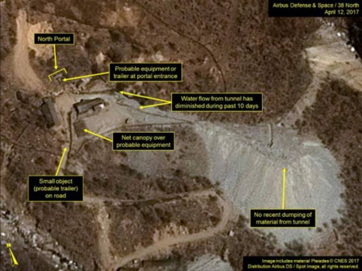 (FILES) This file handout picture obtained on April 13, 2017 from French space agency Centre national d'etudes spatiales (CNES - National Centre for Space Studies), Airbus Defense and Space and the 38 North analysis group, shows a satellite image taken on April 12, 2017 of North Korea's Punggye-ri nuclear test site, with vehicles or trailers parked around the North Portal.North Korea appeared to carry out a sixth nuclear test on September 3, 2017, with seismic monitors measuring an 'explosion' of 6.3 magnitude near its main test site, sending tensions over its weapons ambitions to new heights. The South's Joint Chiefs of Staff said in a statement that the seismic tremor was detected near the North's Punggye-ri test site. / AFP PHOTO / CNES AND Airbus Defense & Space and 38 North / Handout / RESTRICTED TO EDITORIAL USE - MANDATORY CREDIT 'AFP PHOTO / CNES / Airbus Defense and Space / 38 North' - NO MARKETING NO ADVERTISING CAMPAIGNS - DISTRIBUTED AS A SERVICE TO CLIENTS