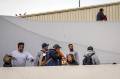 <i>Migrantes deportados son trasladados a albergues en el puerto fronterizo de El Chaparral, en Tijuana (México). Imagen de archivo. EFE/ Joebeth Terríquez</i>