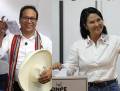 La diferencia de votos entre ambos candidatos es de apenas 1,4 puntos porcentuales. (Foto: EFE)