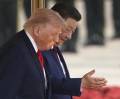 El presidente chino Xi Jinping y el presidente estadounidense Donald Trump. EFE/EPA/Maxim Shemetov / POOL