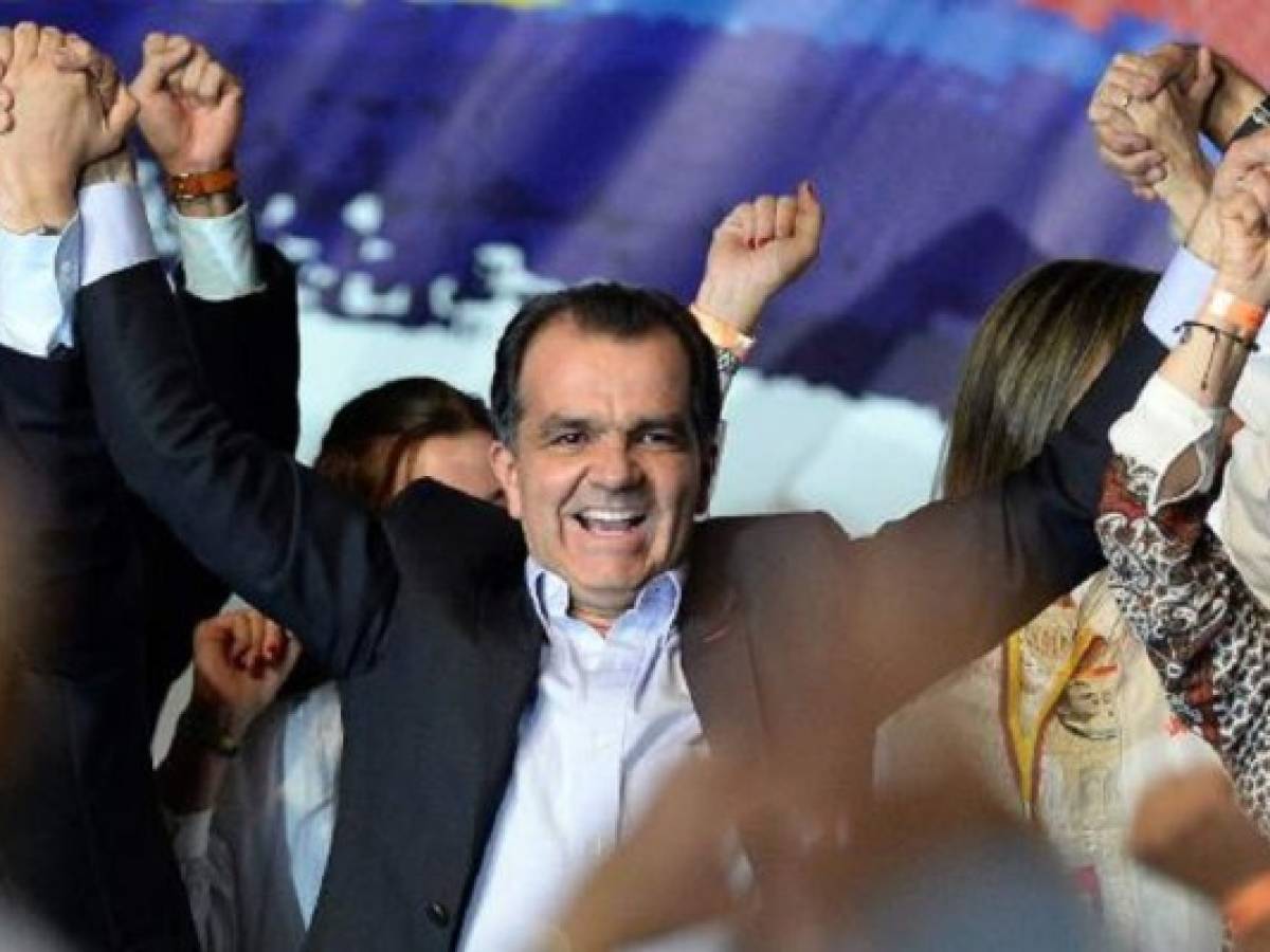 Santos y Zuluaga definirán en segunda vuelta la presidencia de Colombia