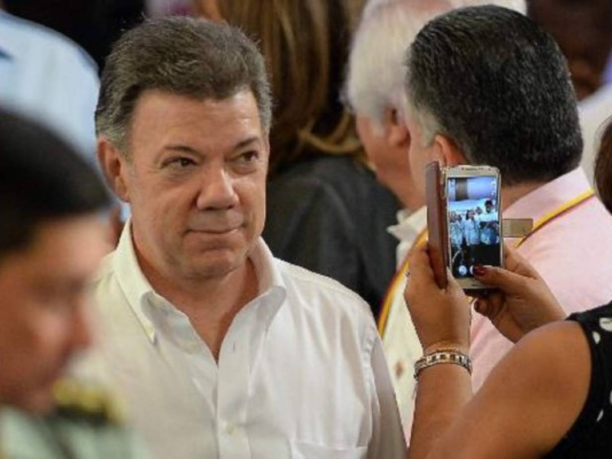 Santos, entre logros económicos y la urgencia de la paz