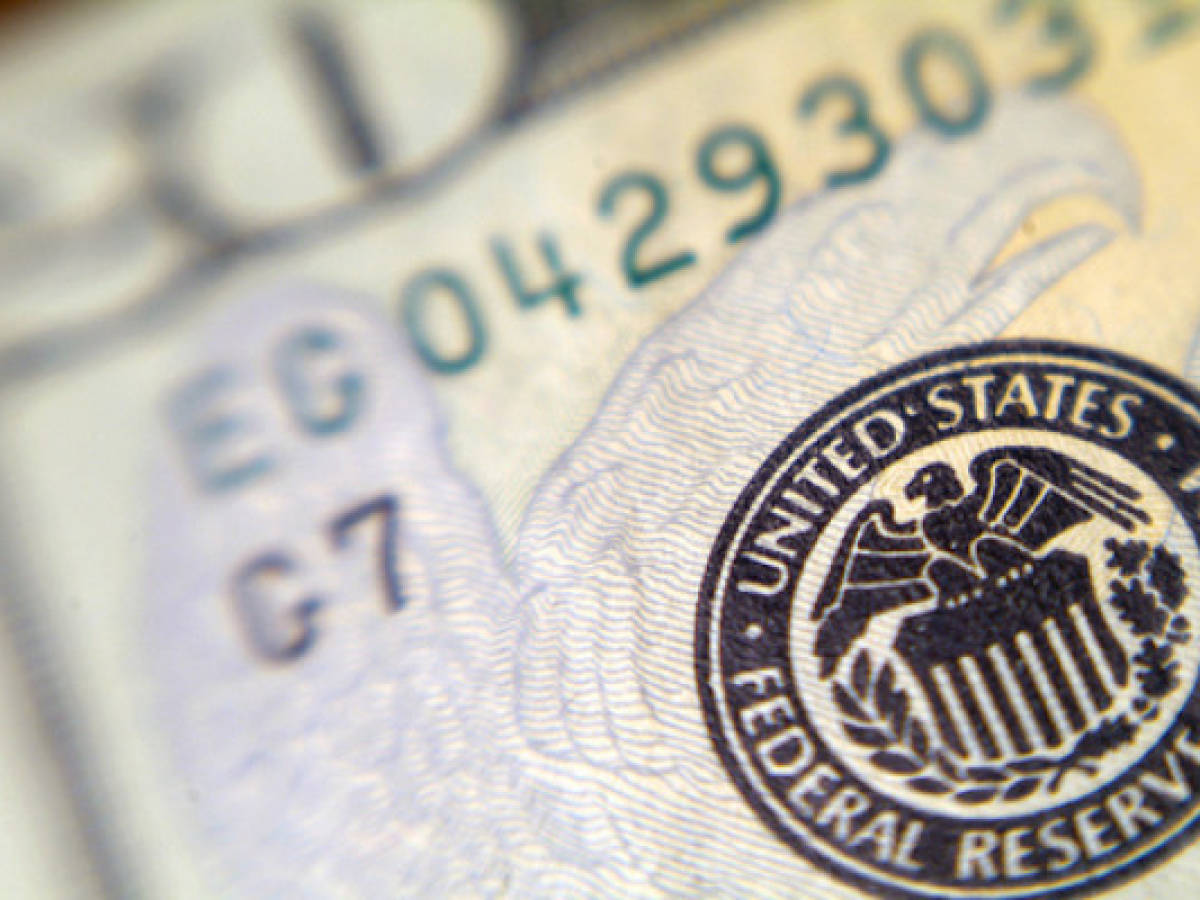 FED baja crecimiento de EE.UU. para 2014 y 2015