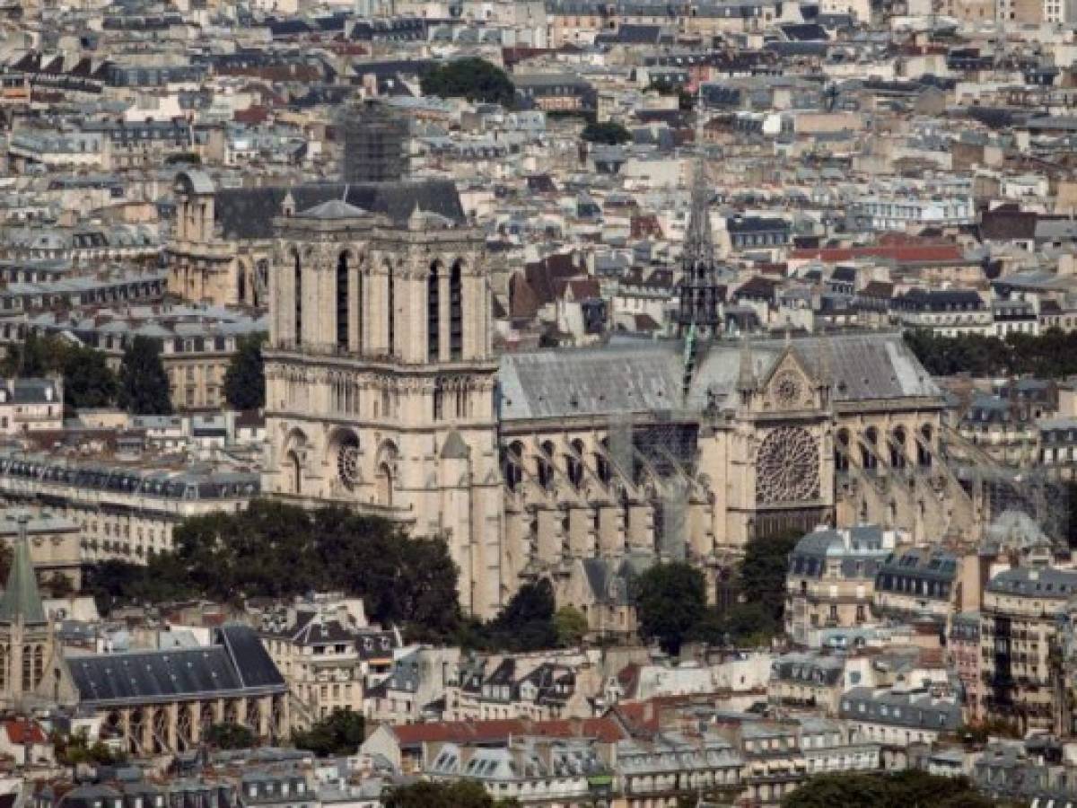 (FILES) A file photo taken on July 15, 2018 shows the Notre-Dame de Paris Cathedral, in the French capital Paris. - A fire broke out at the landmark Notre-Dame Cathedral in central Paris on April 15, 2019 afternoon, potentially involving renovation works being carried out at the site, the fire service said. (Photo by Thomas SAMSON / AFP)