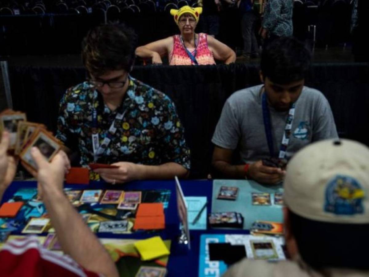 A spectator watches during the first day of the 2019 Pokemon World Championships at the Washington Convention Center August 16, 2019, in Washington, DC. (Photo by Brendan Smialowski / AFP)