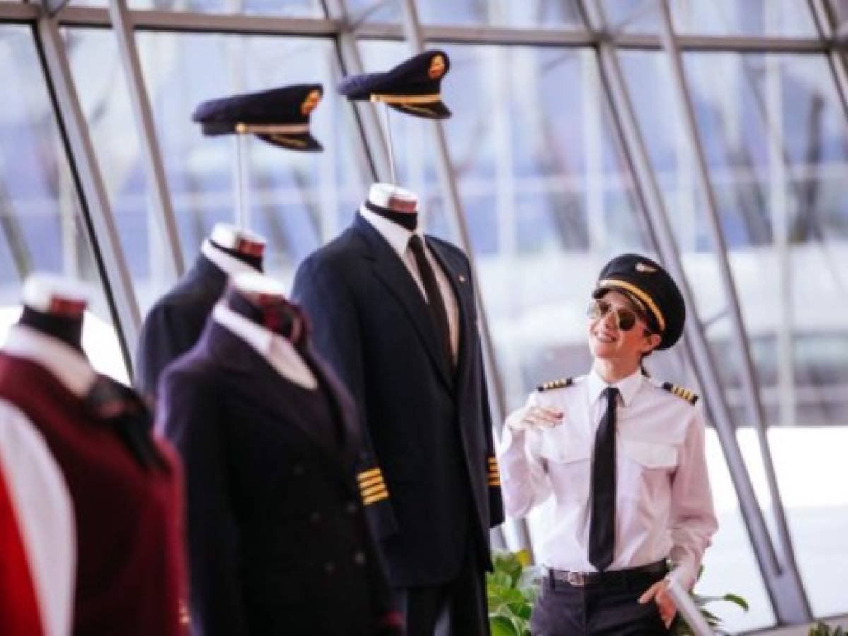 NEW YORK, NY - MAY 15: Vintage TWA uniforms are displayed in the new TWA Hotel at JFK Airport on May 15, 2019 in New York City. The new, 1960's themed hotel built inside the former Trans World Airlines terminal includes high end retail shops, restaurants, and a cocktail bar inside a restored 60-year-old airplane. Kevin Hagen/Getty Images/AFP