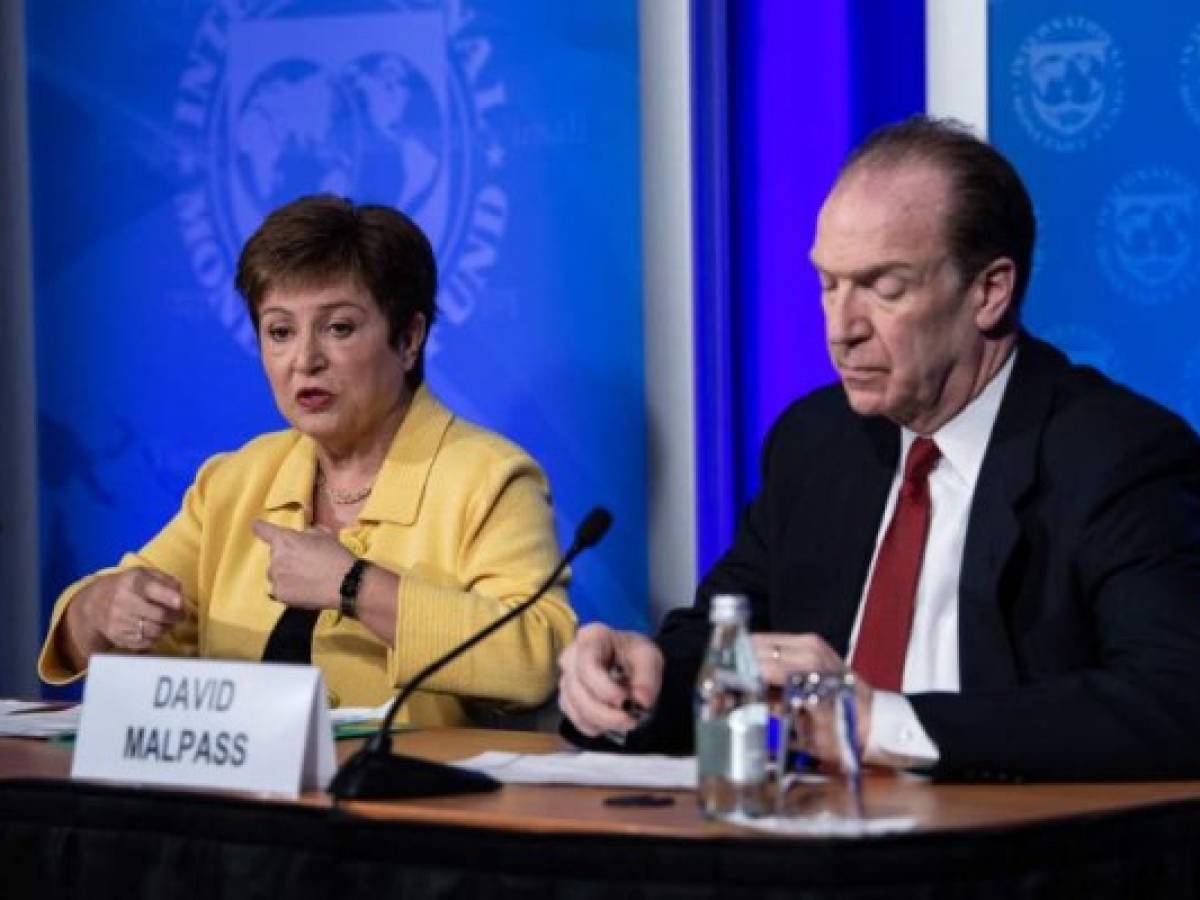 IMF Managing Director Kristalina Georgieva (L) speaks at a press briefing with World Bank Group President David Malpass on COVID-19 in Washington, DC, on March 4, 2020. (Photo by NICHOLAS KAMM / AFP)