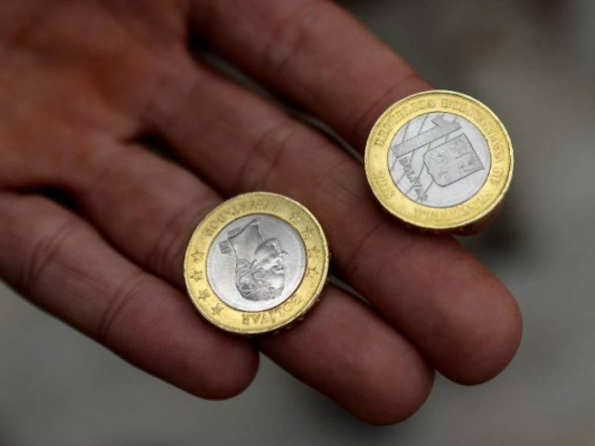 Nuevo sistema cambiario de Venezuela devalúa al bolívar en 96%