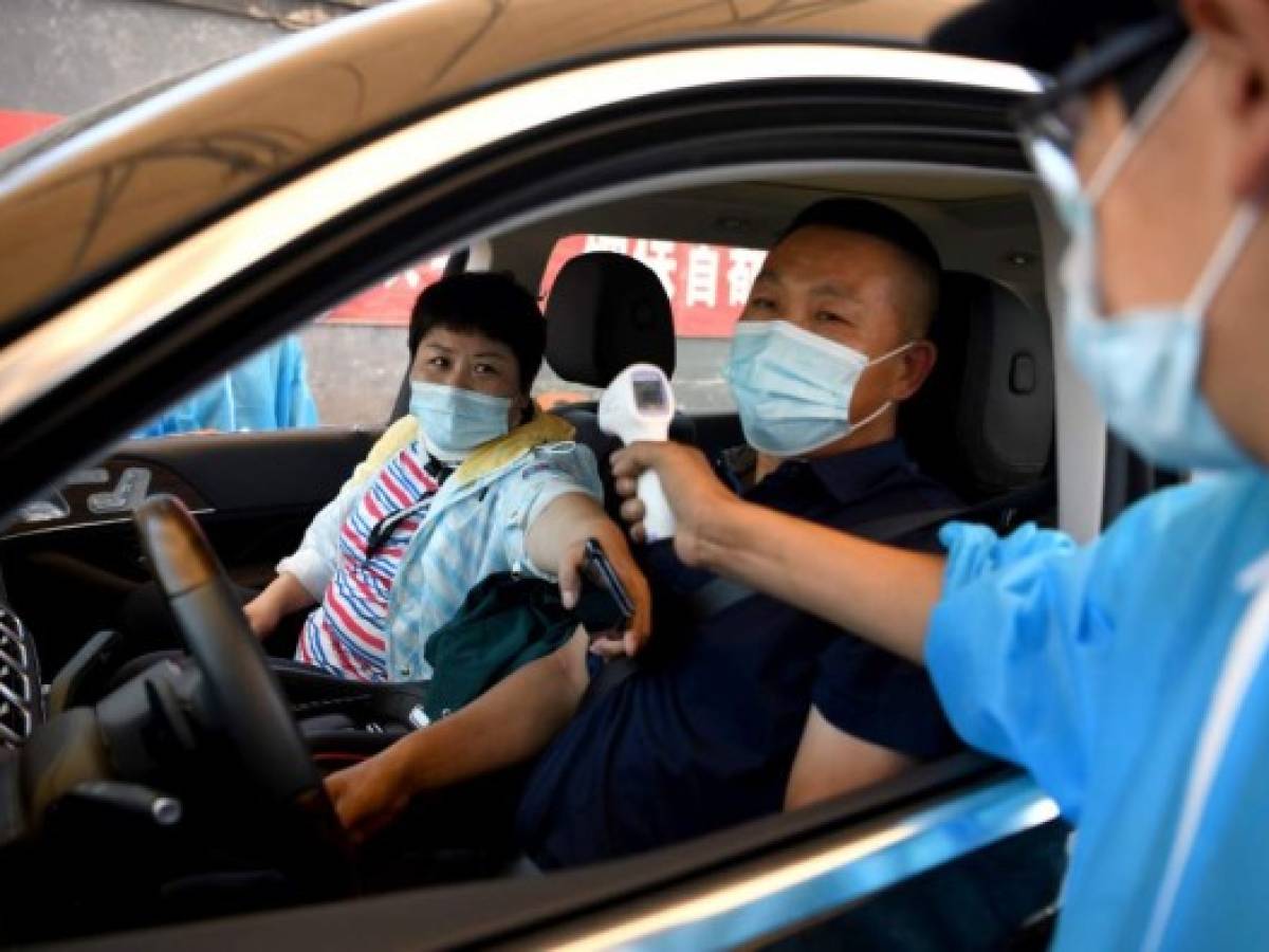 Rebrote de coronavirus en barrios de Pekín impone nuevo confinamiento