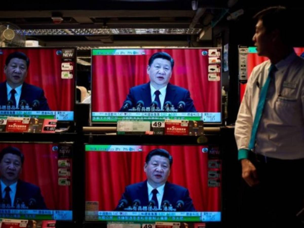 El presidente chino promete abrir más su economía y defiende reformas