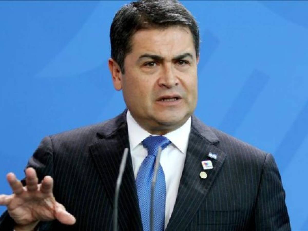 Implican al presidente de Honduras en supuesta conspiración para usar dinero del narco en campaña