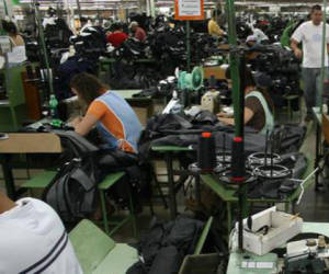 Last of dying breed: Bor Kar Suits, in San Pedro de Poás, is one of 82 remaining Costa Rican textile plants. Ronald Reyes/Tico Times
