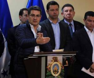 La foto muestra al presidente de Honduras, Juan Orlando Hernández, en conferencia de prensa el 13 de diciembre de 2017. AFP