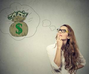 Woman dreaming of financial success