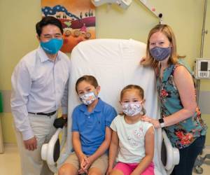 Stephen, Aidan, Avery, and Erin Shih. Aidan, 11, and Avery, 6, are part of a COVID-19 vaccine trial at Kaiser Permanente Los Angeles Medical Center.