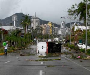 <i>Vista de los daños causados tras el paso del huracán Otis en Acapulco, Estado de Guerrero, México, el 25 de octubre de 2023. FOTO FRANCISCO ROBLES / AFP</i>