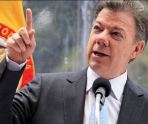 “No he descartado la posibilidad de un cese al fuego bilateral antes de acordemos otros puntos”, dijo telefónicamente a The Wall Street Journal el presidente Santos. (Foto: Archivo)