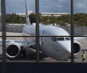 MIAMI, - MARCH 13: An American Airlines Boeing 737 Max 8 is seen as it pulls into its gate after arriving at the Miami International Airport from San Jose, Costa Rica on March 13, 2019 in Miami, Florida. American Airlines is reported to say that it will ground its fleet of 24 Boeing 737 Max planes and it plans to rebook passengers after the Federal Aviation Administration grounded the entire United States Boeing 737 MAX fleet. Joe Raedle/Getty Images/AFP