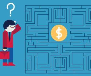 A businessman traverses a labyrinth with a coin on the middle