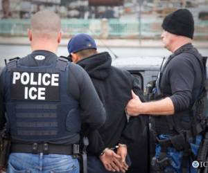 U.S. Immigration and Customs Enforcement (ICE) officers detain a suspect as they conduct a targeted enforcement operation in Los Angeles, California, U.S. on February 7, 2017. Picture taken on February 7, 2017. Courtesy Charles Reed/U.S. Immigration and Customs Enforcement via REUTERS ATTENTION EDITORS - THIS IMAGE WAS PROVIDED BY A THIRD PARTY. EDITORIAL USE ONLY. - RC115D0C3BB0