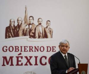 Mexico's President Andres Manuel Lopez Obrador delivers a speech before relatives of 43 missing students, at the National Palace in Mexico City on December 3, 2018. - Lopez Obrador, vowed a 'deep and radical' change in Mexico as he assumed the country's presidency on December 1, signed a decree to create a commission to investigate the 2014 disappearance of 43 students. Four years on, Mexico is still haunted by the disappearance of the students from the Ayotzinapa teachers' college in the southern state of Guerrero. (Photo by Ronaldo SCHEMIDT / AFP)