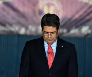 Archivo. En el juicio hoy participó como testigo un contador, nombrado con el pseudónimo de José Sánchez, quien aseguró que presenció reuniones con el presidente de Honduras, Juan Orlando Hernández, y Geovanny Fuentes. (Photo by ORLANDO SIERRA / AFP)