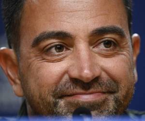 <i>El entrenador español del Barcelona, Xavi, reacciona durante una rueda de prensa en el estadio Dragao de Oporto, el 3 de octubre de 2023, en vísperas del partido de fútbol del grupo H de la primera ronda de la Liga de Campeones de la UEFA, día 2, entre el FC Porto y el FC Barcelona. FOTO MIGUEL RIOPA/AFP</i>