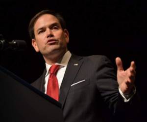US Senator Marco Rubio speaks before the arrival of US President Donald Trump at the Manuel Artime Theater in Miami, Florida on June 16, 2017.US President Trump will announce a clampdown on US business with Cuba and tighter rules on travel to the island, in a move to roll back his predecessor Barack Obama's historic outreach to Havana. Trump headed early Friday to Miami's Little Havana, spiritual home of the Cuban-American exile community, to unveil the policy shift in an address at the Manuel Artime Theater -- named after an anti-communist veteran of the ill-fated Bay of Pigs invasion. / AFP PHOTO / MANDEL NGAN