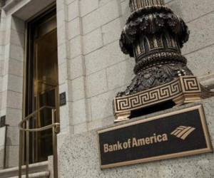 (FILES) In this file photo taken on May 11, 2018 A sign for Bank of America is seen on 3rd Avenue in New York City, on May 11, 2018. - Bank of America reported on October 15, 2018 a jump in third-quarter earnings, benefiting from higher interest rates and overall loan growth in a strong US economy.The second biggest US bank by assets, Bank of America reported net income of $6.7 billion, up 35.1 percent from the year-ago period. Revenues rose 4.3 percent to $22.8 billion. (Photo by HECTOR RETAMAL / AFP)