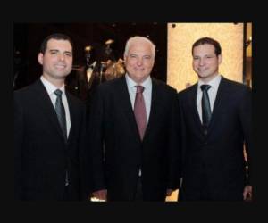 Luis Enrique Martinelli (R) and Ricardo Martinelli Jr., sons of Panamanian former president (2009-2014) Ricardo Martinelli, remain handcuffed after being arrested in Guatemala City, on July 6, 2020. - The arrest comes after the lawyer of Panama's former president Ricardo Martinelli said he must face corruption charges, just eight months after he was acquitted of spying on political foes. (Photo by Johan ORDONEZ / AFP)