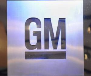 (FILES) This file photo taken on January 12, 2009 shows the logo of General Motors at the North American International Auto Show in Detroit, Michigan.General Motors announced January 17, 2017 plans to invest about $1 billion in its U.S. factories, following recent criticism of the company by President-elect Donald Trump. / AFP PHOTO / STAN HONDA