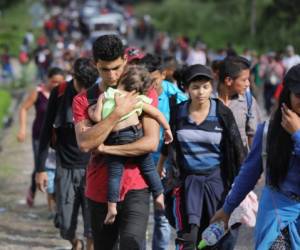 ESQUIPULAS, GUATEMALA - OCTOBER 15: A caravan of more than 1,500 Honduran migrants moves north after crossing the border from Honduras into Guatemala on October 15, 2018 in Esquipulas, Guatemala. The caravan, the second of 2018, began Friday in San Pedro Sula, Honduras with plans to march north through Guatemala and Mexico en route to the United States. Honduras has some of the highest crime and poverty rates in Latin America. (Photo by John Moore/Getty Images)